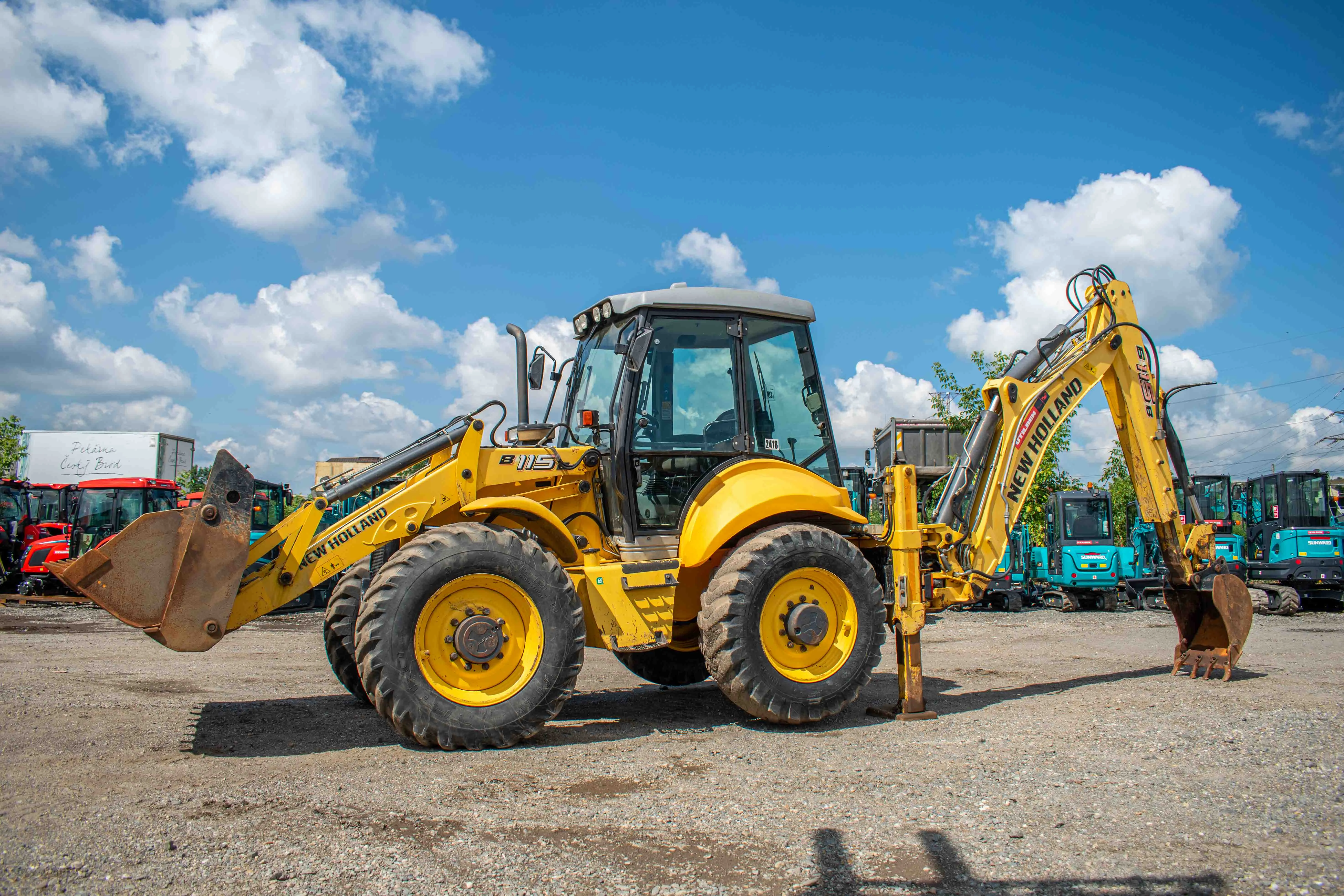 Buldoexcavatoare 115 